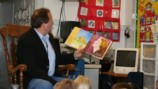 Governor reading to children